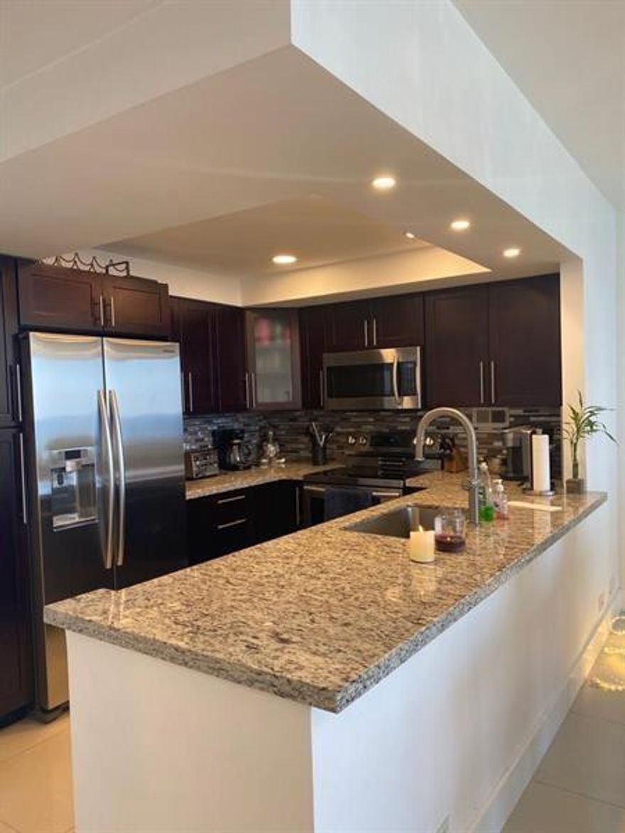 AVAILABLE for 3 months starting from  9-28-2025 thru 11-28-2025.  2bed/2bath CONDO Beautifully upgraded! Ocean front view condo!! granite counter tops Furnished no clutter, washer & dryer in the unit, Great Amenities which include a nice pool and gym access to the beach! Great Location Publix in front to the right of the building, Hollywood board walk is 5 minutes by car and is walking distance, nice restaurants and not far from airport!