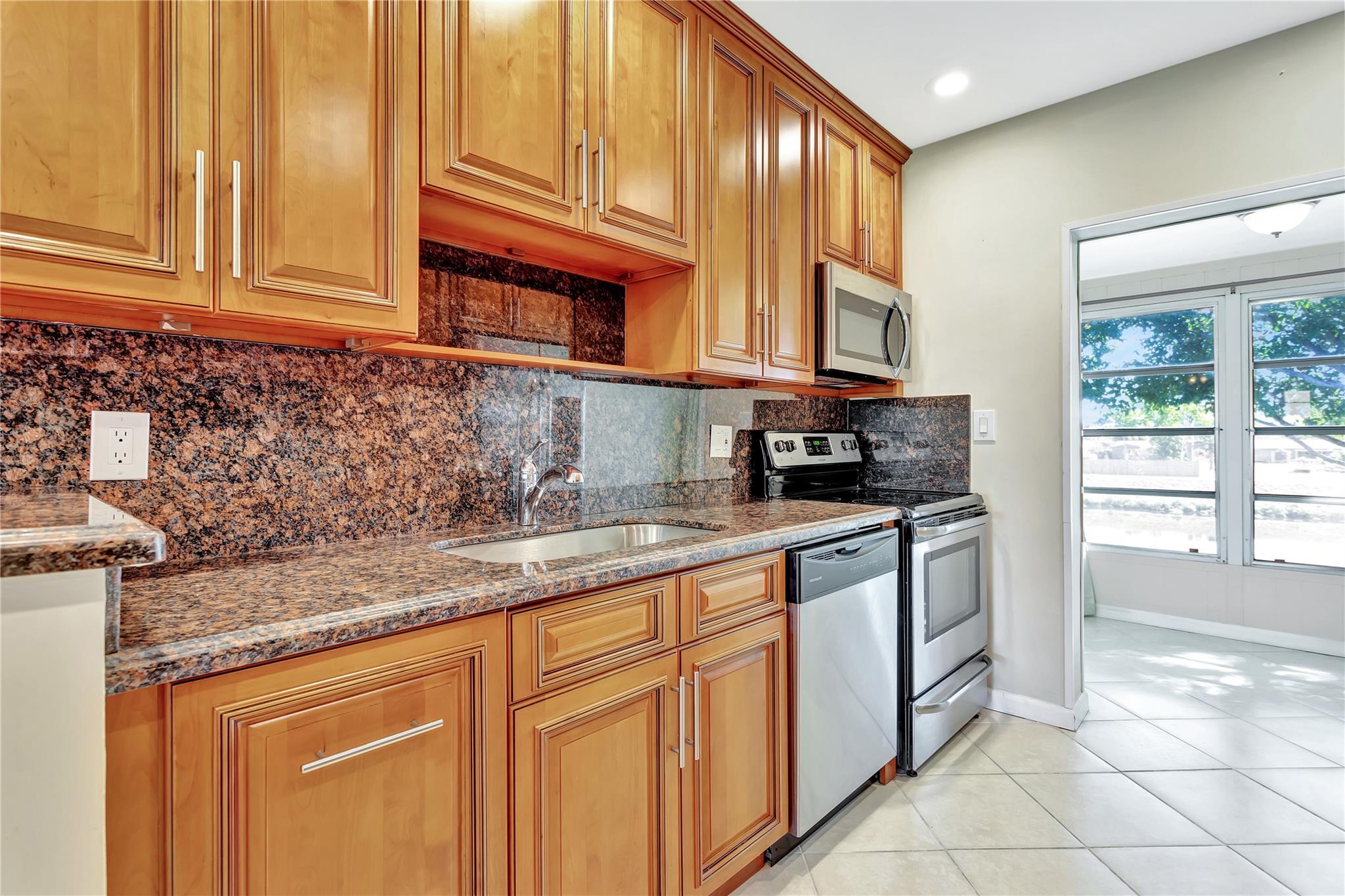 UNIQUE AND ONE OF A KIND BEAUTY! TURN KEY...JUST BRING YOUR SUITCASE. TOTALLY REMODELED! BRIGHT AND SPACIOUS 1 BEDROOM WITH 1.5 BATHS. CUSTOM BUILT CABINETRY FOR YOUR OVER SIZED KITCHEN WITH BONUS EATING AREA TO ENJOY THE SERENE WATER VIEWS ALL DAY LONG! BEAUTIFUL GRANITE COUNTER TOPS AND APPLIANCES. TILED THROUGH OUT CONDO. MASTER BEDROOM FEATURES EXTENDED LIVING AREA WITH A SITTING AREA OR PRIVATE OFFICE FOR YOUR COMFORT, 2 MARTHA STEWART CLOSET BUILT-INS. MASTER BATH UPDATED WITH A SIT IN SHOWER ALONG WITH GRAB BARS. UPGRADED TO THE MAX! ASSOCIATION STATES 55+ COMMUNITY, MUST SHOW $40,000 INCOME, 700 CREDIT SCORE AND 6 MONTH SECURITY DEPOSIT REQUIRED. GREAT ACTIVE COMMUNITY OFFERS POOL, BUNCO, SHUFFLEBOARD TOURNAMENTS, EXERCISE ROOM, BILLIARDS PLUS MORE.