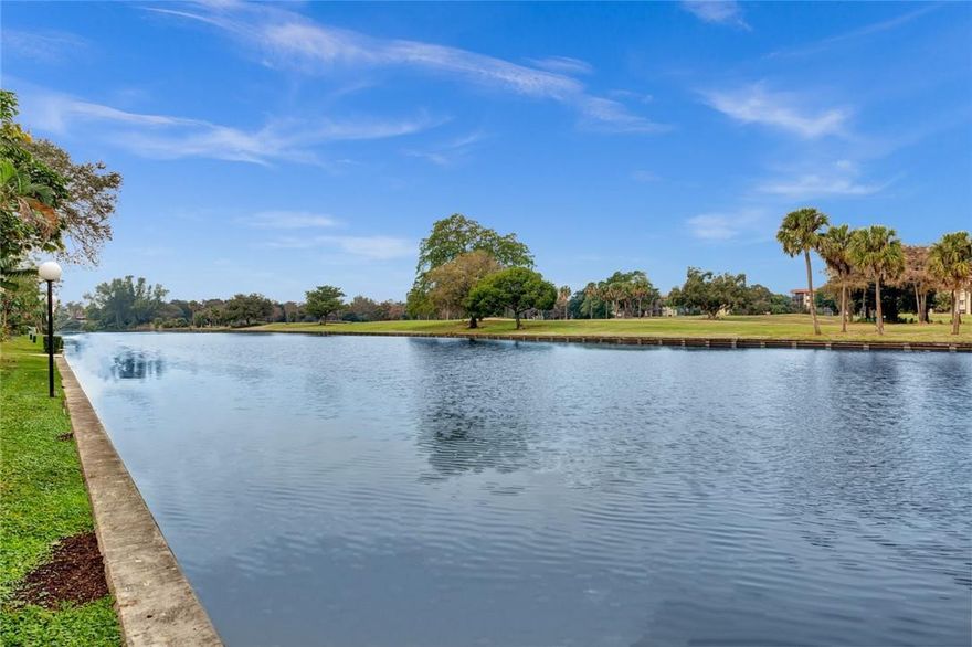 Live the Las Vistas lifestyle in this tastefully furnished Contemporary Penthouse.  ALL water views from the screened balcony that has a full size washer and dryer.  This 2 bedroom 2 full bathroom apartment is turnkey as the furniture is negotiable (please exclude the patio furniture). All TILE floors, kitchen that has a peek-a-boo cut out so you are still part of the activity in your living/dining rooms, and spacious!!  There’s TWO walk in closets in the main bedroom and one in the 2nd bedroom.  There’s a storage room on the 3rd floor of the building.  $429 monthly fee includes 5Ghz HIGH SPEED Internet, cable/HD tv, water, trash, sewer, insurance, and security patrol in a gated community.   Las Vistas is a 55 years old and better community in the Inverrary subdivision.  The community offers pools, saunas, a meeting room and a clubhouse, card room, library, shuffleboard courts, and an exercise room.  Golf courses, tennis, shopping, transportation, and beaches all nearby.