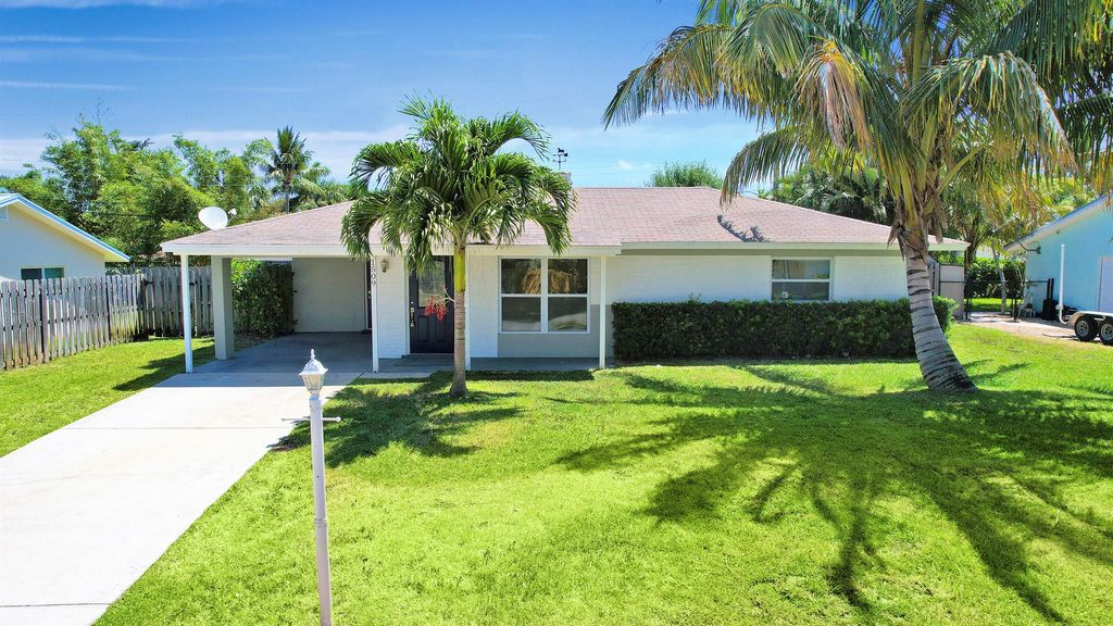 Photo of 1509 Venus Avenue, Jupiter, FL 33469 (MLS # R10990760)
