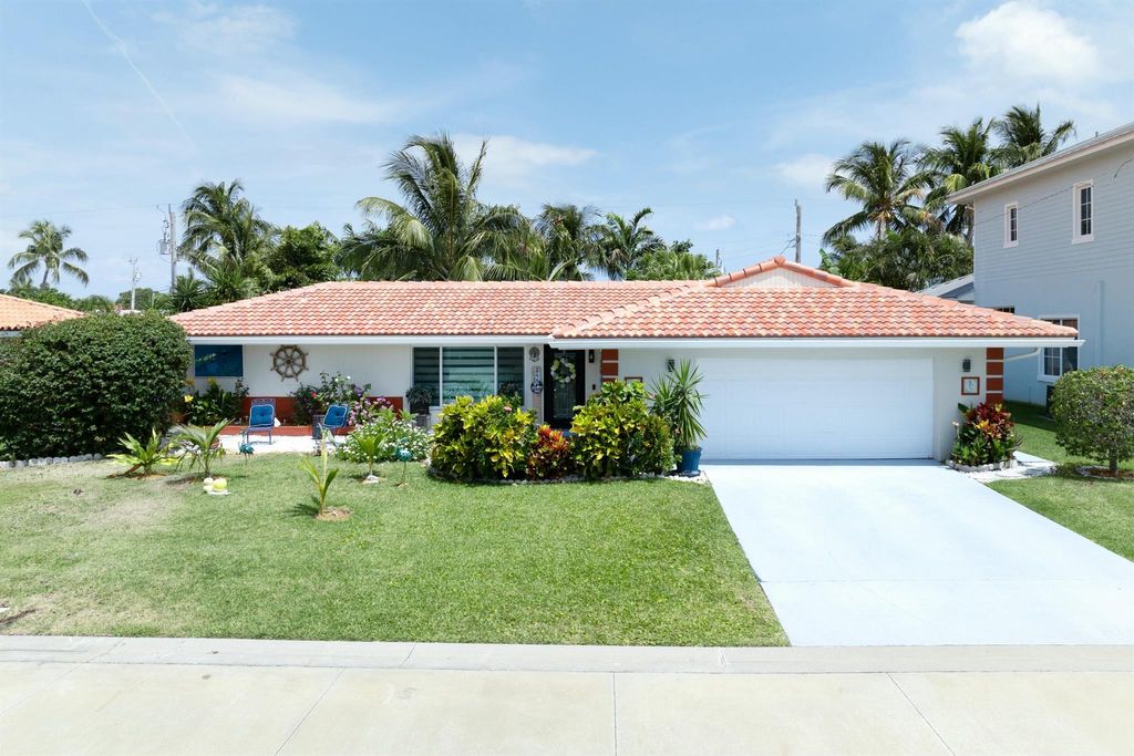 Photo of 1050 Singer Drive, Singer Island, FL 33404 (MLS # R11084209)