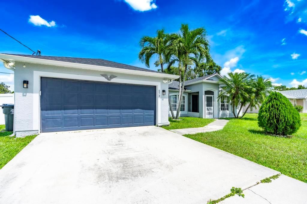 Photo of 573 SW Cherryhill Road, Port Saint Lucie, FL 34953 (MLS # R11101833)