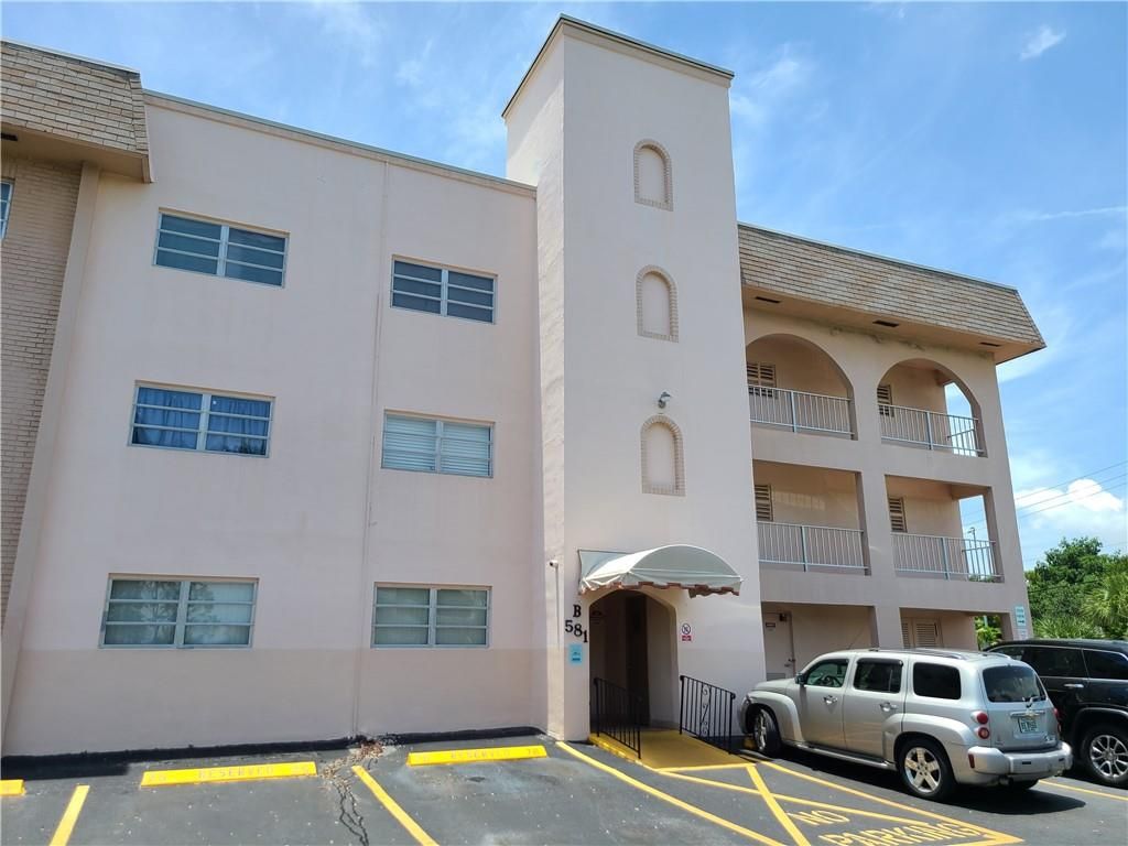 Photo of 581 Blue Heron Dr #102, Hallandale Beach, FL 33009 (MLS # F10292893)