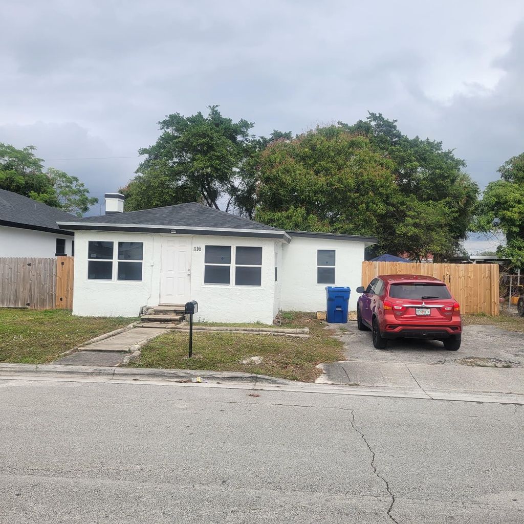Photo of 1116 W 32nd Street, Riviera Beach, FL 33404 (MLS # F10548092)