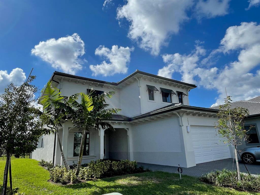 Banyan Cay, New Tortuga Model, located within The Residences at Banyan Cay Resort & Golf. New Construction 2021, Upgraded Tortuga Model, 4BR, 4.5BA +Den, +Media Room, 2-Car Garage, 3101sf LA, 4065sf total. Master Bedroom & Den on Main Level, All Bedrooms have their own on-suite bathrooms!, Dual Zone HVAC, Oversized master suite, with open floor plan throughout. Not shown in photos - fully fenced yard, luxury quality full window treatments, ceiling light fixtures and fan/light combinations in every room. Lake view, Fully Fenced/Gated Yard, covered loggia. The Residences are private, gated, and security-guard protected. Banyan Cay is centrally located to Downtown WPB and Palm Beach.