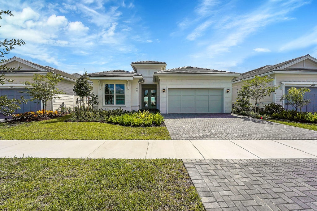 Photo of 12669 Nautilus Circle, Palm Beach Gardens, FL 33412 (MLS # B26085927)