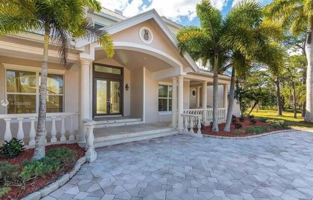 Photo of 5100 SW Blue Sky Lane, Palm City, FL 34990 (MLS # R11056940)