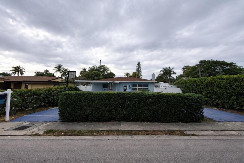 Photo of 5823 Churchill Circle W, West Palm Beach, FL 33405 (MLS # R11159072)
