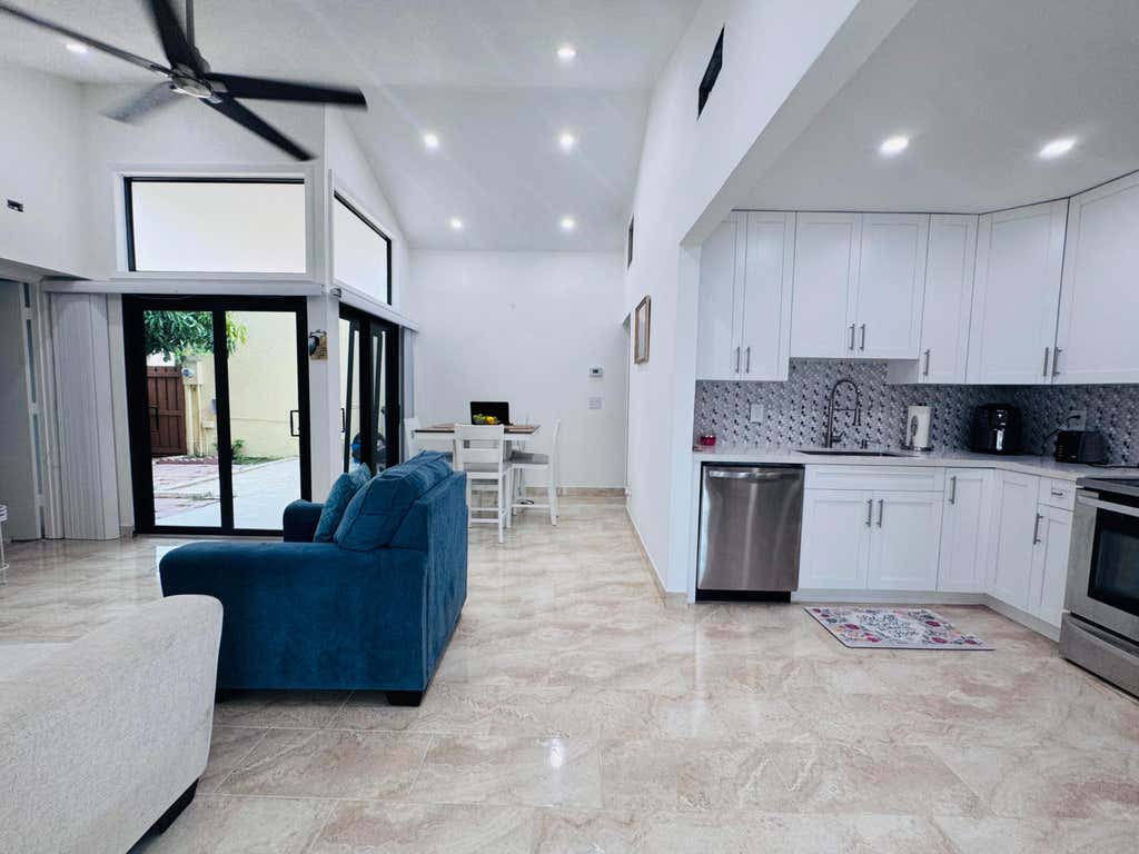 Photo of 4918 ALDER Drive #D, West Palm Beach, FL 33417 (MLS # B26060990)