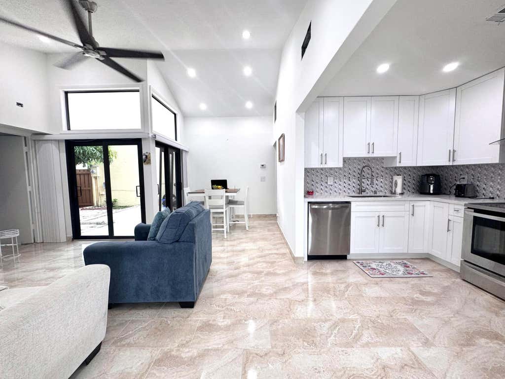 Photo of 4918 ALDER Drive #D, West Palm Beach, FL 33417 (MLS # B26060990)