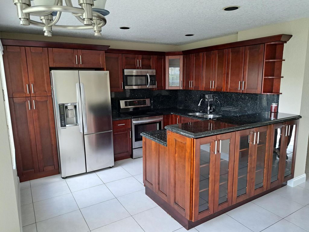 Photo of 9133 S Boca Gardens Cir Circle S #A, Boca Raton, FL 33496 (MLS # B26027857)