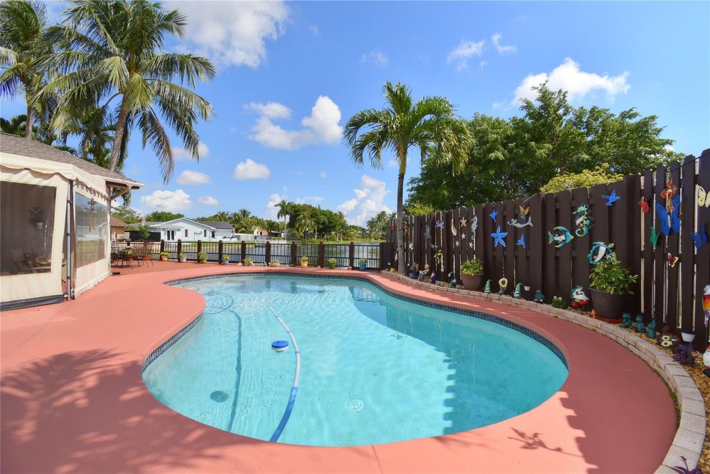 Photo of 4148 NW 19th Ter, Oakland Park, FL 33309 (MLS # F10532762)
