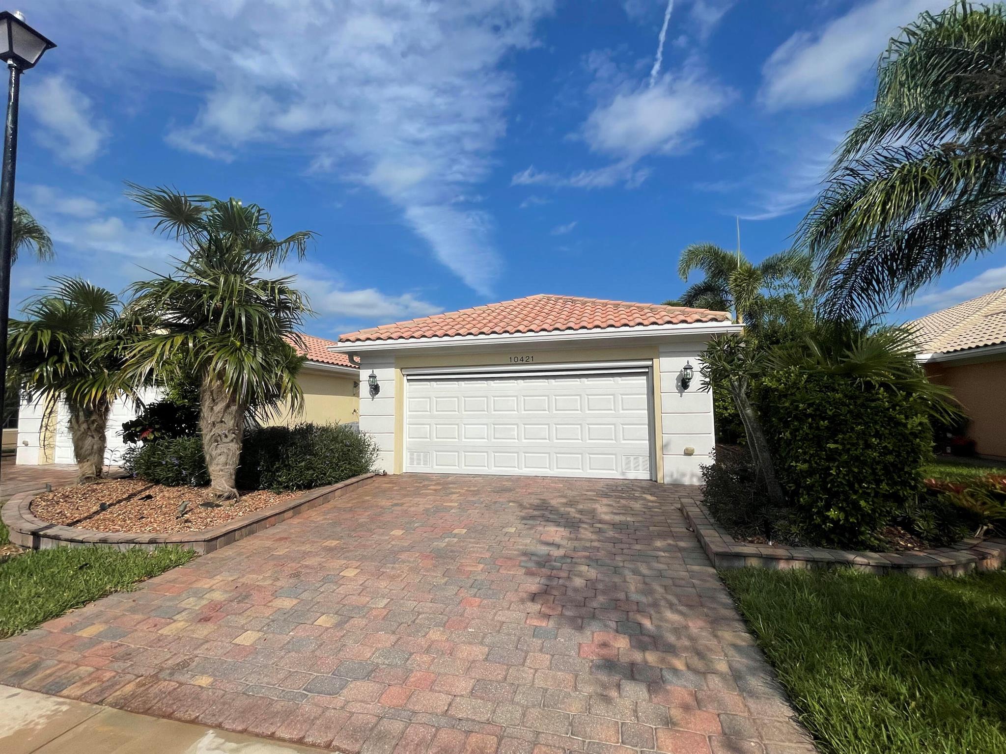 Available 02/01/2025. Remodeled villa with faux fireplace, sunroom built with impact glass, huge private brick paver patio, lots of tile, granite. and screened garage! Spacious open floor plan with 2 Master suites, central vacuum system, laundry room w/sink, all tiled. Quiet gated community close to everything. Rent includes basic cable, internet, use of clubhouse and pools. No Smokers. One well-behaved dog considered with non-refundable pet fee. This is unfurnished annual lease,