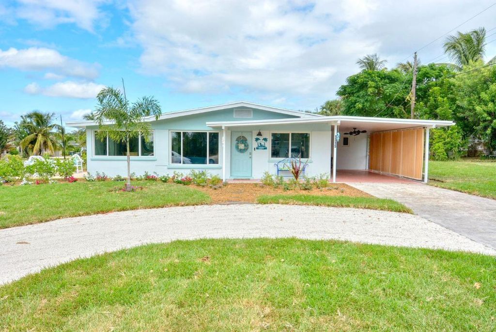 Photo of 1315 NE Flora Place, Jensen Beach, FL 34957 (MLS # R10953430)