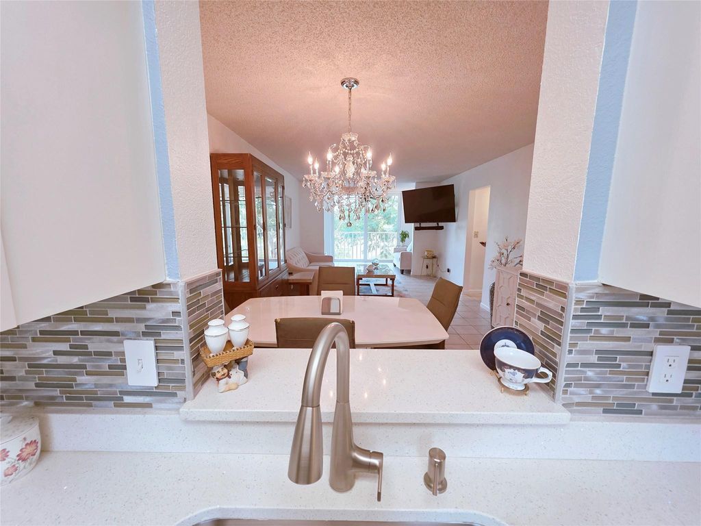 Photo of 7145 Huntington Lane #208, Delray Beach, FL 33446 (MLS # F10551518)