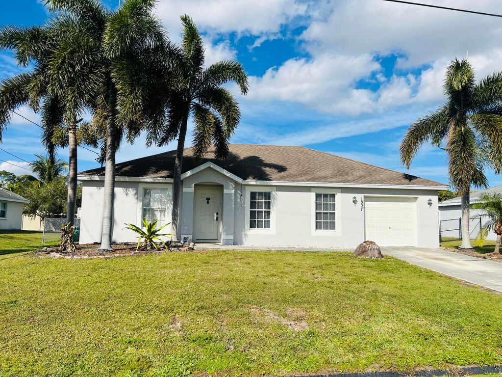 Photo of 1827 SW Dalmatian Avenue, Port Saint Lucie, FL 34953 (MLS # R11057162)