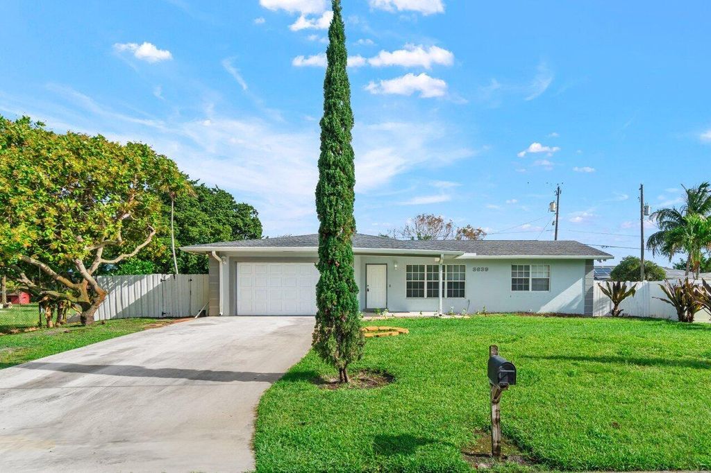 Photo of 3639 Harlowe Avenue, Boynton Beach, FL 33436 (MLS # R11137998)