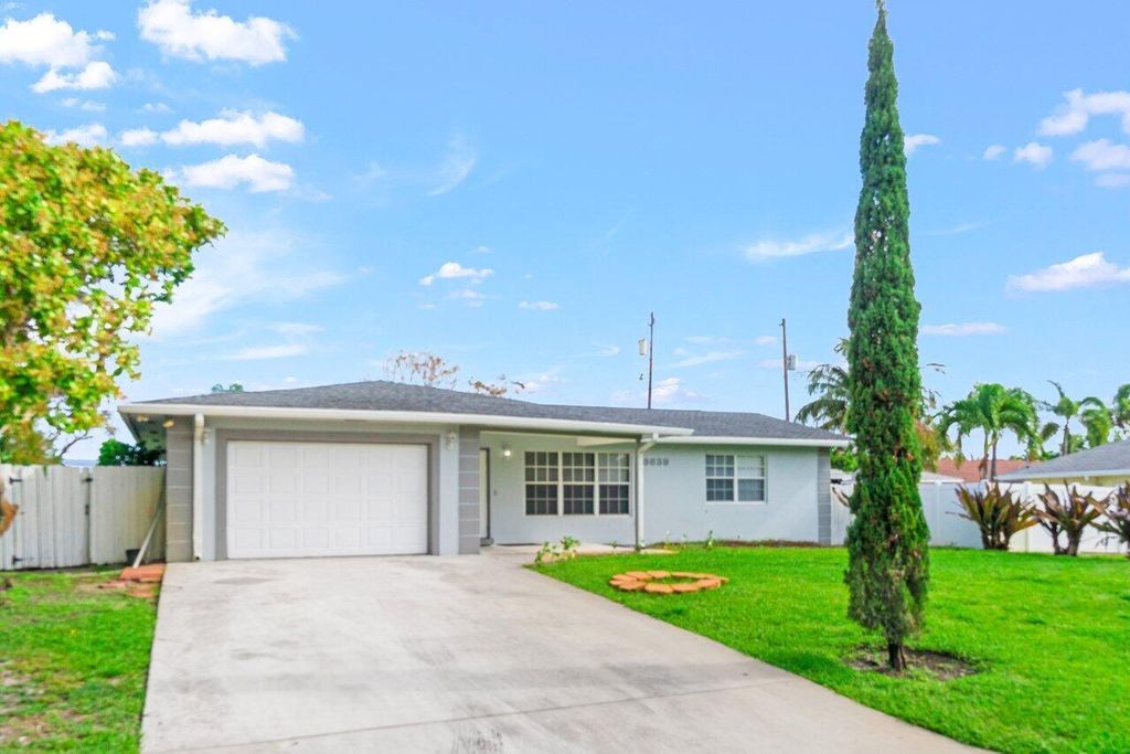 Photo of 3639 Harlowe Avenue, Boynton Beach, FL 33436 (MLS # R11137998)