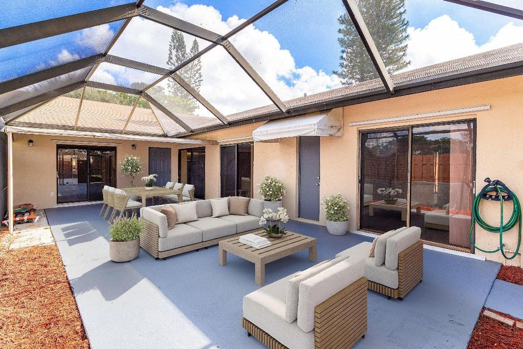 Photo of 1160 Pitusa Court #D, West Palm Beach, FL 33415 (MLS # R11130313)