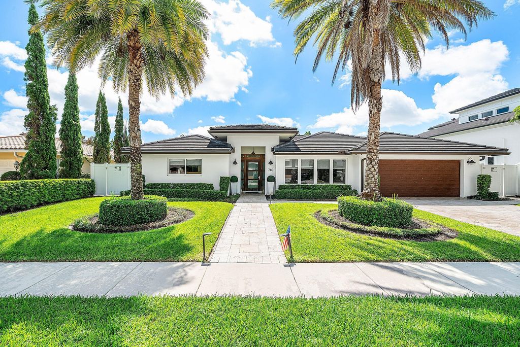 Photo of 740 NE 36th Street, Boca Raton, FL 33431 (MLS # B26021920)