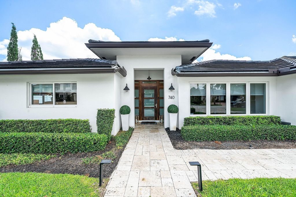 Photo of 740 NE 36th Street, Boca Raton, FL 33431 (MLS # B26021920)