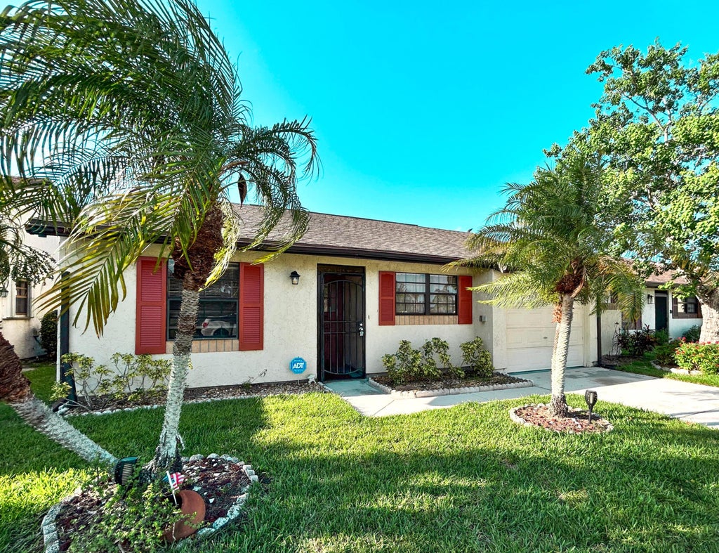 Photo of 2241 SE Barrington Street, Port Saint Lucie, FL 34952 (MLS # B26046031)