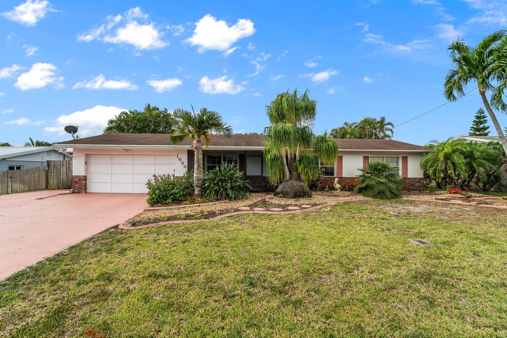 Photo of 1664 NE 24th Street, Jensen Beach, FL 34957 (MLS # R11083678)