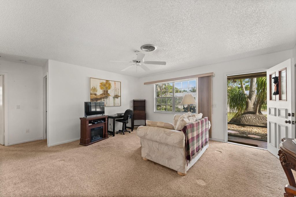 Photo of 1664 NE 24th Street, Jensen Beach, FL 34957 (MLS # R11083678)