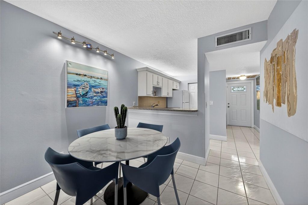 Photo of 2920 NE 8th Terrace #103, Oakland Park, FL 33334 (MLS # F10535660)