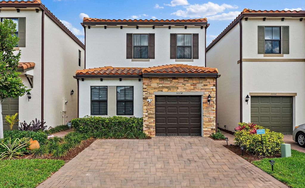 Photo of 3004 King Palm Way, Riviera Beach, FL 33410 (MLS # R10793798)