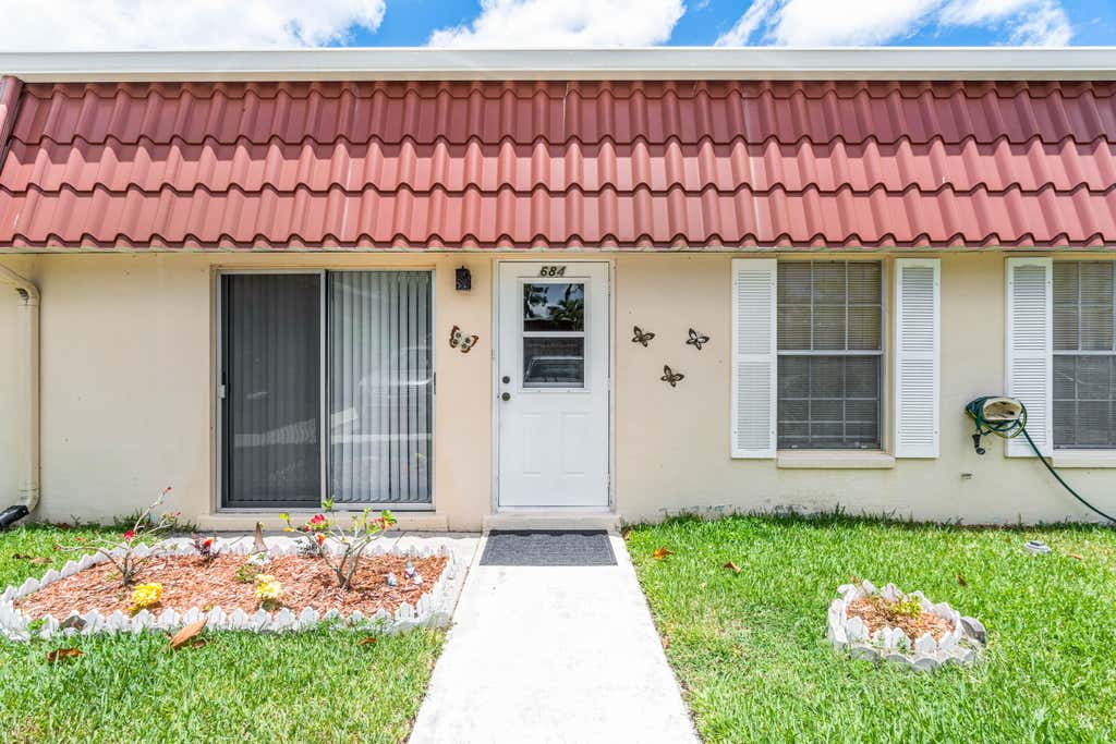 Photo of 684 Marlboro Oval Oval, Lake Worth, FL 33467 (MLS # R10990582)