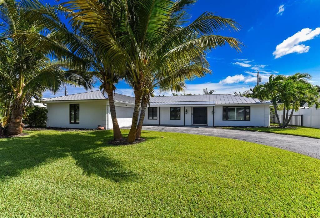 Photo of 124 Anchorage Drive N, North Palm Beach, FL 33408 (MLS # R10888543)