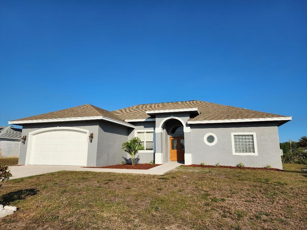 Photo of 3697 SW Rosardo Street, Port Saint Lucie, FL 34953 (MLS # R10976078)