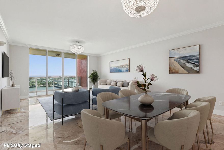 Experience resort-style living in this beautifully renovated 3-bedroom, 3.5-bath, 1,990 sq. ft. Ocean Tower residence on the 15th floor of Marina Grande—a hidden gem with breathtaking views of both the ocean and the Intracoastal Waterway. This elegant condo showcases high-end finishes throughout, including custom marble and oak flooring (NO CARPET), intricate stonework, granite countertops, glass tile accents, crown molding, and detailed wood trim. The luxurious bathrooms are fully remodeled, featuring pebble stone shower floors with frameless glass shower doors, floating double vanities. Large custom closets in all the bedrooms. Every space is enhanced with exquisite lighting and designer fixtures, reflecting meticulous attention to detail. Marina Grande offers some of the best amenities in the area: a newly renovated pool deck with a whirlpool spa, a social lounge with a cozy fireplace, sauna and steam rooms, a well-equipped fitness center, and a vibrant community room. Outdoor enthusiasts will enjoy four pickleball courts, tennis courts, bocce ball, and a game room with ping pong and pool tables. A full-service marina is just steps away, and the convenience of Publix right across the street makes everyday living effortless.