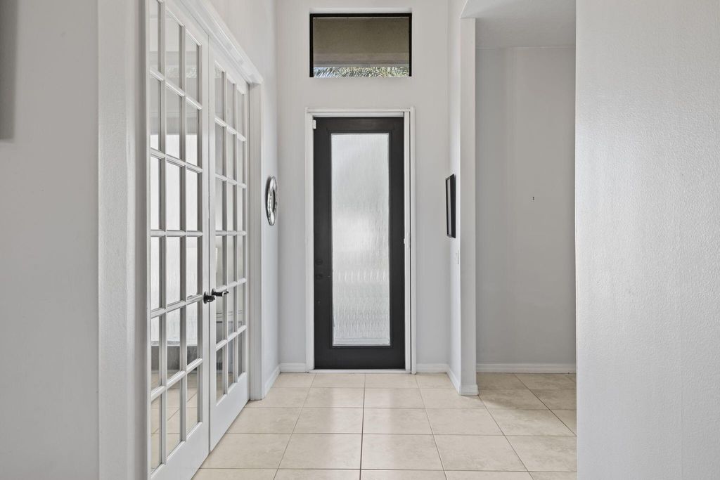 Photo of 5898 NW Dowse Street, Port Saint Lucie, FL 34986 (MLS # R11083299)