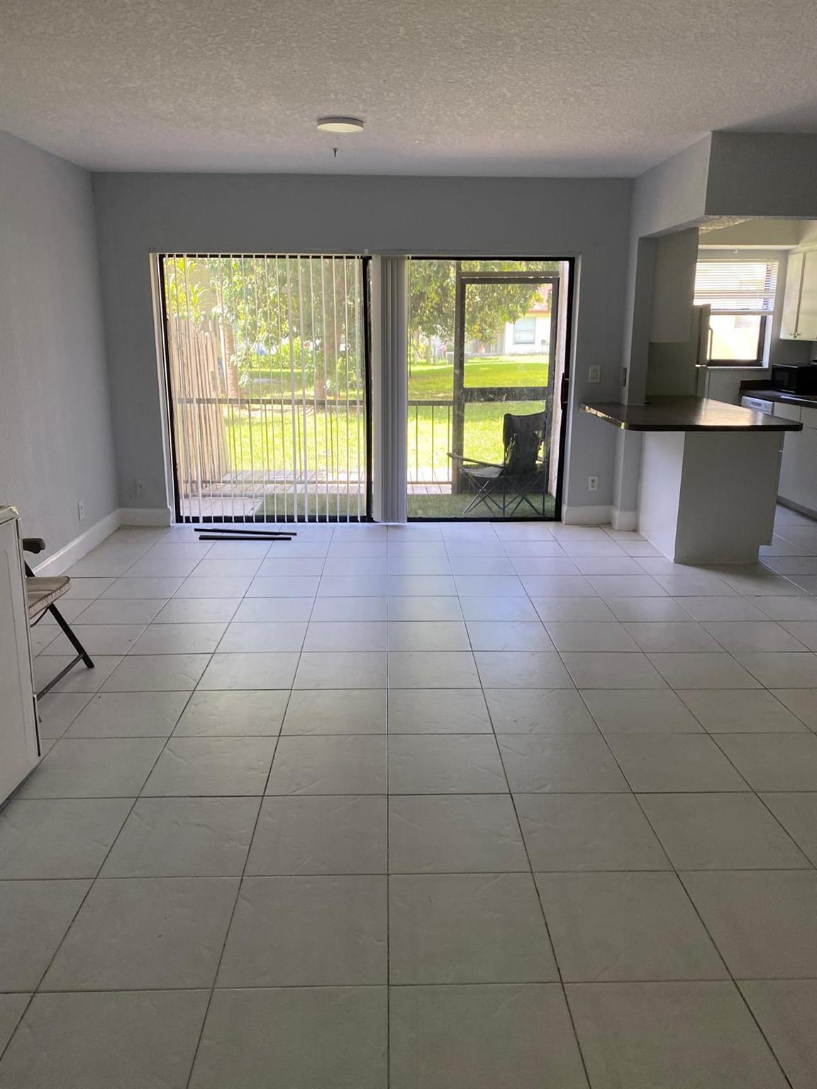 ALL RENOVATED GROUND FLOOR VERY LARGE APARTMENT FOR RENT IN BOCA RATON. Rent includes Water. Two new bathrooms, Very large well kept 2 BR and 2 bath with Large screened patio, Walking closet and extra closet, All tile floor, Plus a small area ideal for dining table or desk for work from home. Very bright unit and fresh painting. One bathroom with walk-in shower and Second bathroom with tub. Close to Shopping center of Wholefood, Barns & Nobel, Walk to FAU, Boca High school, Boca Middle school, Boca Raton Hospital, 2 miles away from the Boca Raton Beach, and Ocean Breeze Golf Course, open to the public. Very close to the I-95. Great parking.