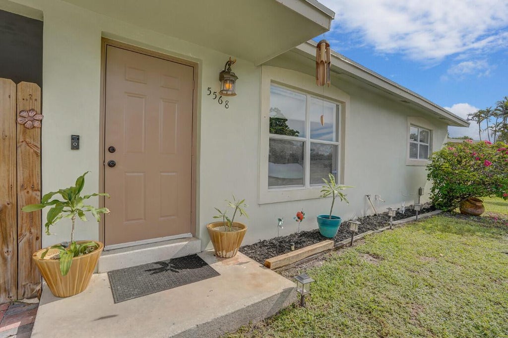 Photo of 5568 Balfrey Drive, West Palm Beach, FL 33413 (MLS # R11122611)