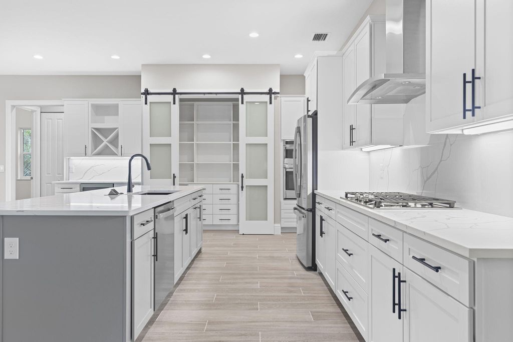 Photo of 179 SE Via Lago Garda, Port Saint Lucie, FL 34952 (MLS # R11121078)