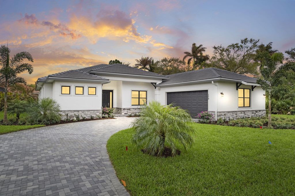 Photo of 179 SE Via Lago Garda, Port Saint Lucie, FL 34952 (MLS # R11121078)