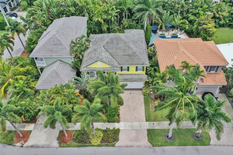 MUST SEE TO APPRECIATE! This grand estate 4bed/4bath home with over 3,000 sq feet of living space, features impact glass, travertine flooring, loft(5th bedroom option), 2 car garage with custom storage and 10 ft ceilings. Custom open concept kitchen with granite countertops and backsplash. Enormous primary suite features natural light and a trayed ceiling, double walk in closets and a spa like ensuite with twin sinks and private commode. Private balcony off Primary bedroom. One bedroom located on 1st floor with a private patio. The 2nd floor balcony connects a bedroom and the loft. Laundry room on 2nd floor. Located 2 blocks from Wilton Drive's restaurants, bars and shopping district, as well as Richardson Historic Park and preserve. This is a magnificent home in a fabulous neighborhood.