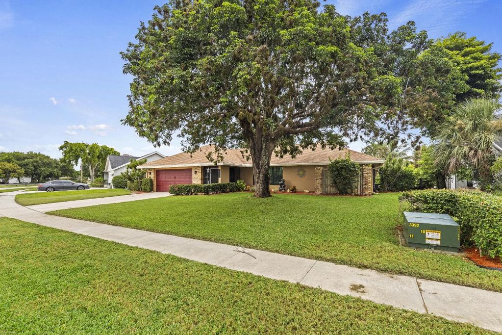 Photo of 8272 Blue Cypress Drive, Lake Worth, FL 33467 (MLS # R11155328)