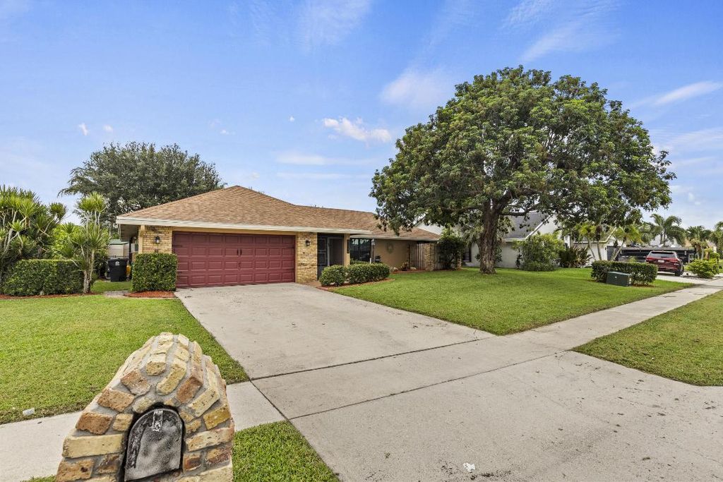 Photo of 8272 Blue Cypress Drive, Lake Worth, FL 33467 (MLS # R11155328)