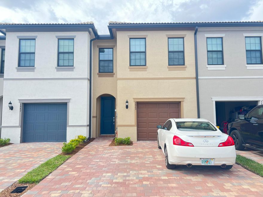 Located in The Fields at Gulfstream Pol, this high-end townhome at 4843 Indio Trl boasts an array of luxurious features. With whole-house impact glass, 9-foot ceilings, and tile flooring downstairs, this property offers both style and practicality. The clubhouse, resort-style pool, fitness studio, spa, firepit, and playspace cater to a vibrant lifestyle, while the tennis and basketball courts provide ample opportunities for recreation. The open kitchen with Shaker-style cabinetry, quartz countertops, and a massive seated bar is perfect for entertaining. The large laundry room, complete with cabinets and a sink, and the stainless steel appliances, including a fridge, stove/oven, and built-in microwave, add convenience to the home. A small patio, 1-car garage The Fields by Divosta is a gated, master planned community with low HOA fees, located minutes from nearby shopping, dining, A-rated schools and adjacent to the Florida Turnpike! From the moment you turn down Polo Road, The Fields feels like home. Located on the former historic Gulf Stream Polo Fields, this new Central Palm Beach County community offers consumer-inspired townhomes and single-family homes featuring flexible living spaces, open gathering areas, and well-appointed kitchens.  Enjoy the resort amenities including neighborhood pool, tot lot, and clubhouse with fitness center and activity room, or step outside and enjoy a wealth of local recreational amenities.