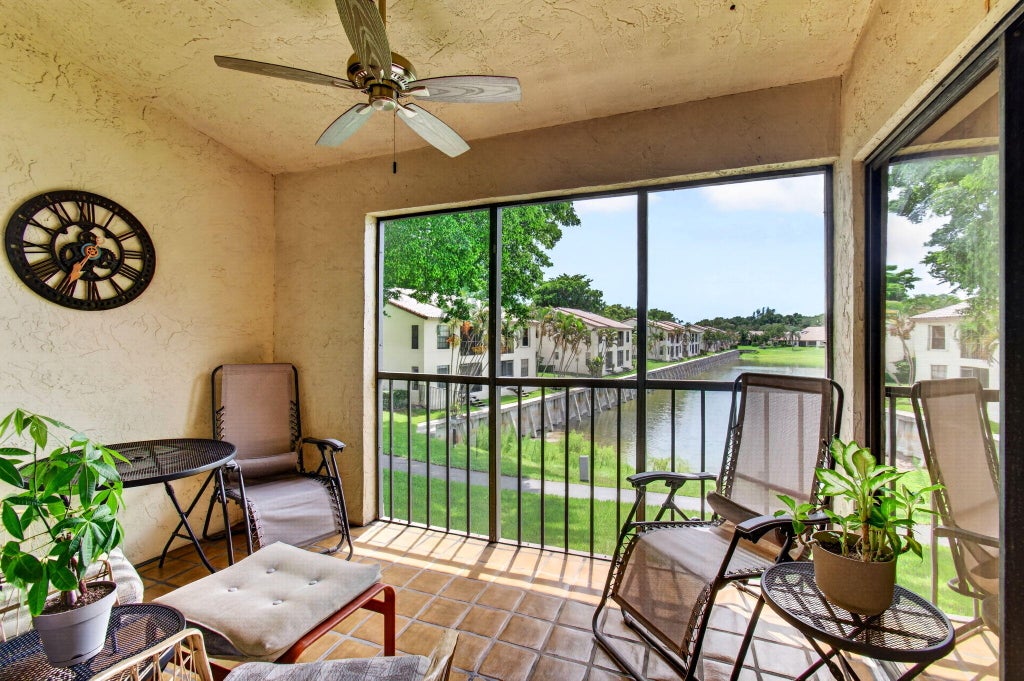 Photo of 330 PALMWOOD Place #208, Boca Raton, FL 33431 (MLS # B26088805)
