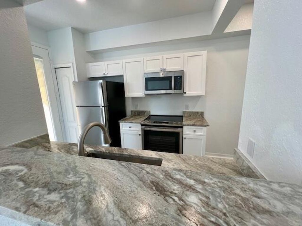 Photo of 11019 Legacy Lane #303, Palm Beach Gardens, FL 33410 (MLS # R11080176)