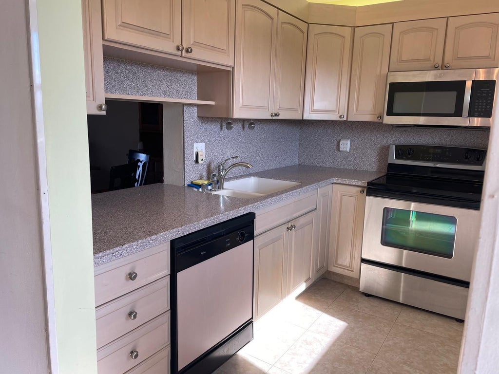 Photo of 2520 NE 1st Court #411, Boynton Beach, FL 33435 (MLS # B26092785)