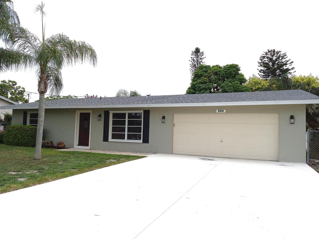 Photo of 840 SE Degan Drive, Port Saint Lucie, FL 34983 (MLS # R11003610)