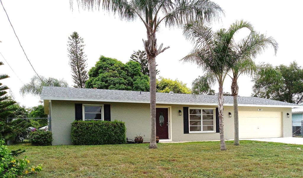 Photo of 840 SE Degan Drive, Port Saint Lucie, FL 34983 (MLS # R11003610)