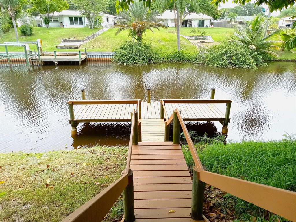 Photo of 840 SE Degan Drive, Port St Lucie, FL 34983 (MLS # R11003610)