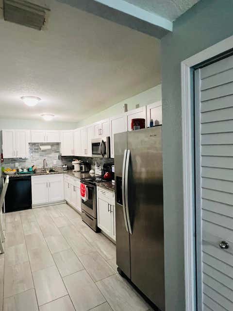 Tiny photo for 8719 N Ashley Street, Tampa, FL 33604 (MLS # B26036237)